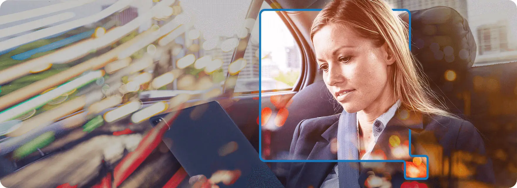 Female business person sitting in back of car while ready from smart device