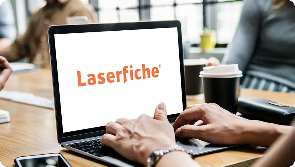 Laptop screen showing Laserfiche logo